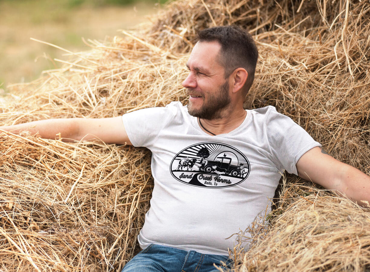 Sand Creek Farms logo printed on a t-shirt mockup.